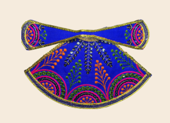 Decorative blue fabric with colorful patterns.