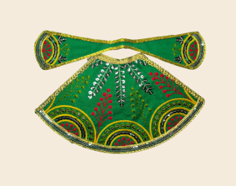 Decorative green and gold brooch with floral patterns 